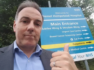 Cllr Adrian England outside Hemel Hospital